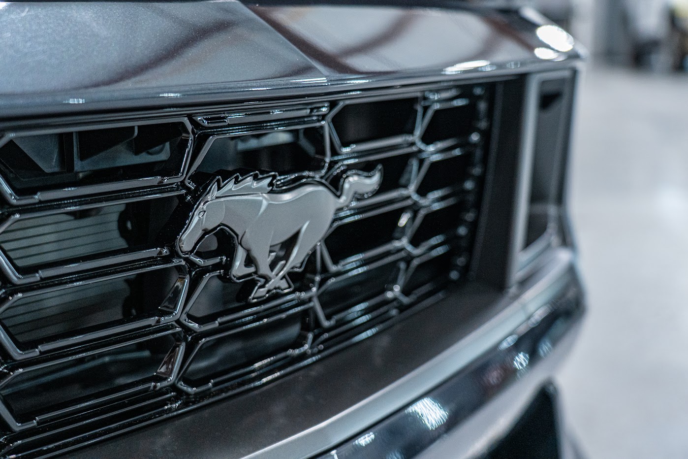 Mustang Dark Horse running pony grille badge